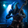 flux_nomad_Xenomorph_from_movie_ALIENS_playing_a_normal_upright_86e16f19-9e34-46fa-9449-b83f1d...png
